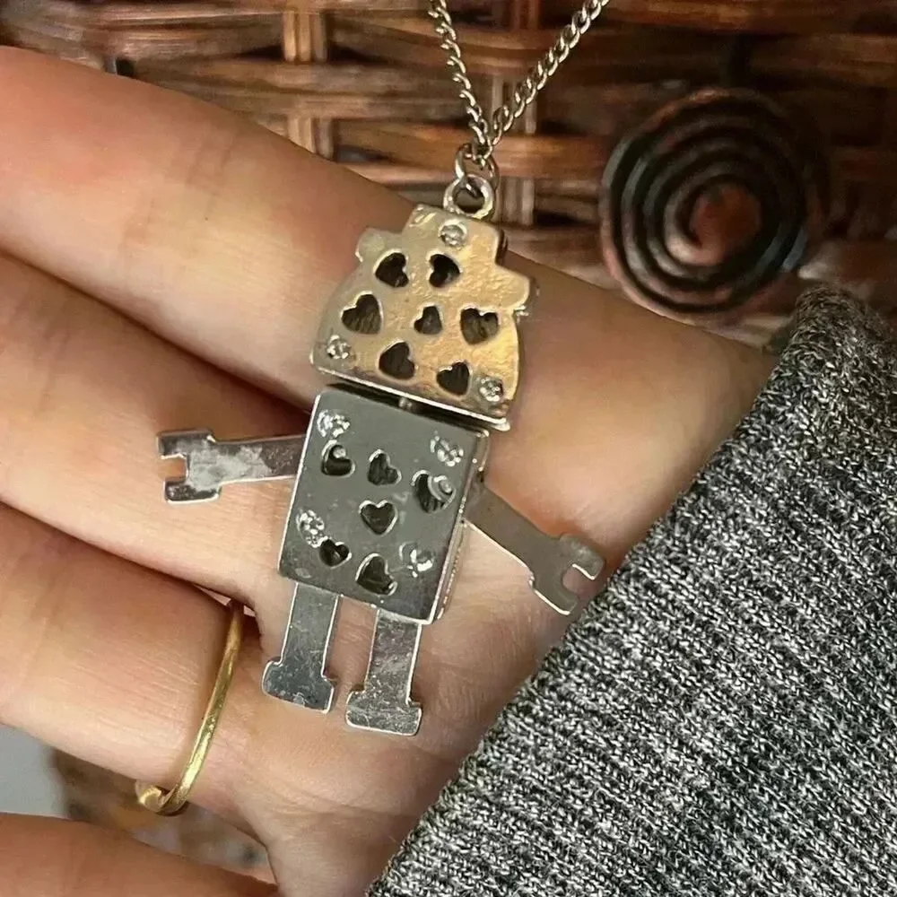 Articulating robot necklace on a silver tone chain